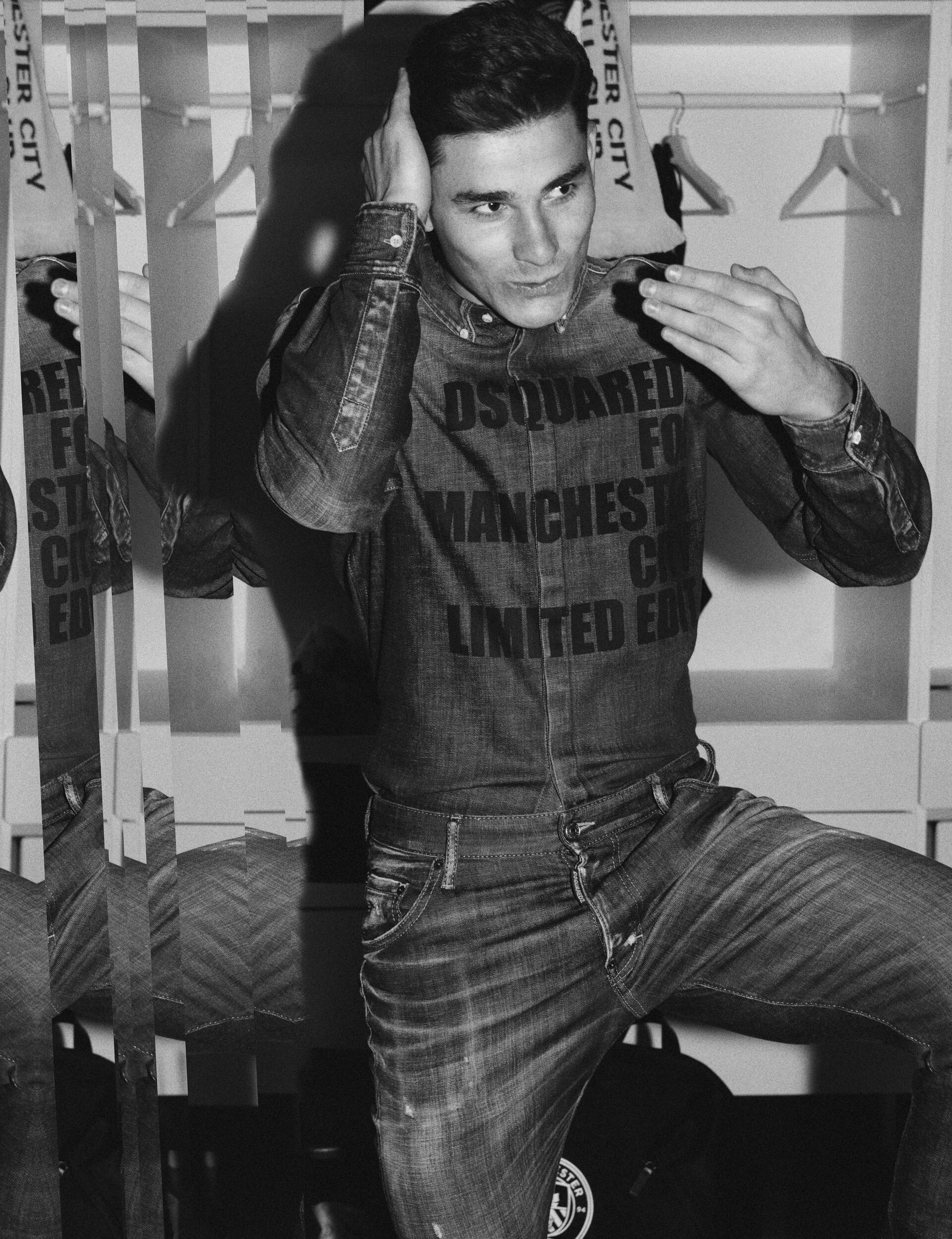 Picture in black and white of julian alvarez wearing a denim shirt and denim jeans from the new dsquared2 x manchester city capsule collection